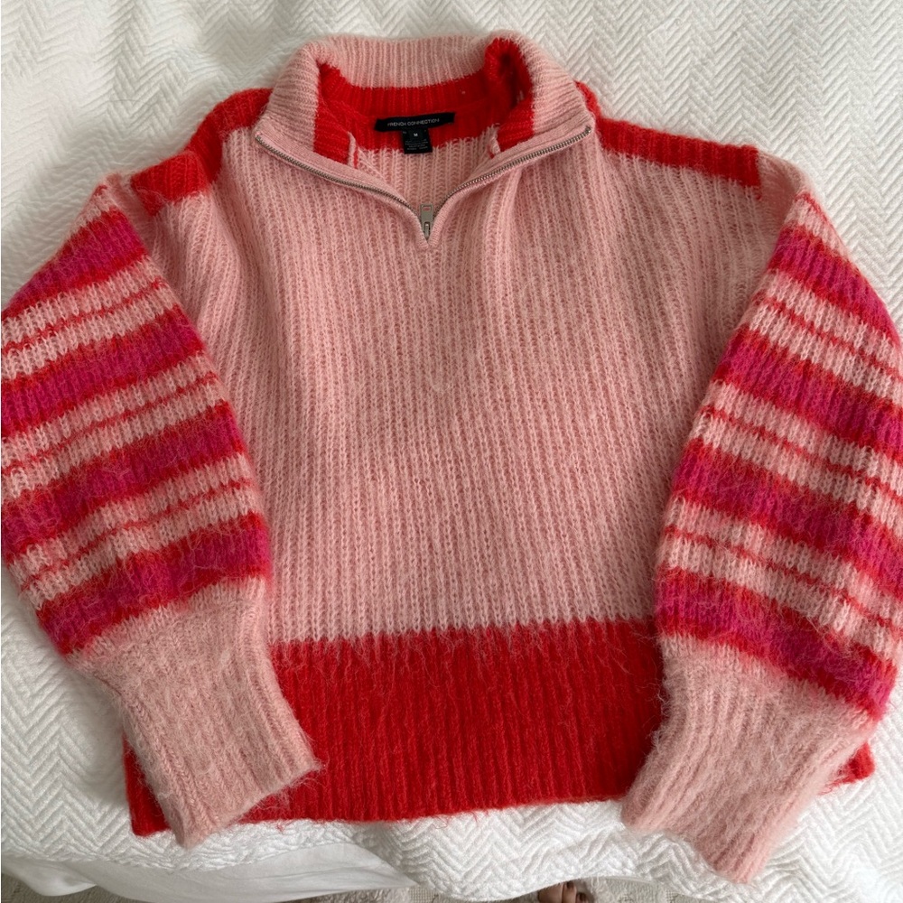Pink and orange half zip sweater